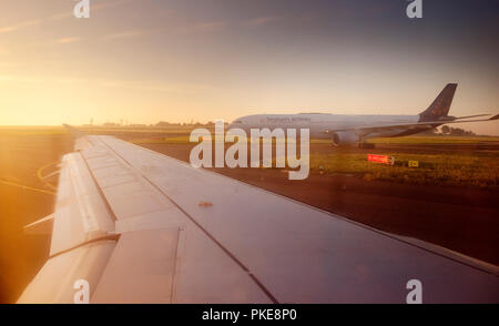 A Brussels Airlines airplane landing on the airport ramp or apron of the Brussels National Airport (Belgium, 10/08/2012) Stock Photo