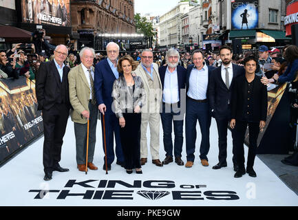 Left to right, Jim Broadbent, Sir Michael Gambon, Sir Michael Caine, Francesca Annis, Ray Winstone, Sir Tom Courtenay, Paul Whitehouse, Charlie Cox and Jamie Cullum arriving for the King of Thieves World Premiere held at Vue West End, Leicester Square, London. Stock Photo