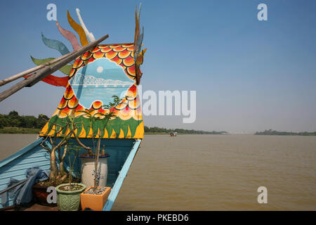 Prow of a tourist dragon boat on the Perfume River (Sông Hương or Hương Giang), Hue, Viet Nam Stock Photo