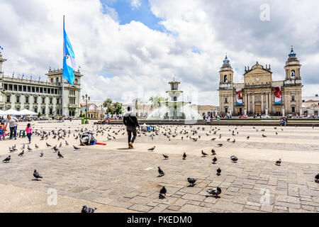 Guatemala City, Guatemala -  September 5, 2018: Presidential palace National Palace of Culture & Cathedral of Guatemala in Plaza de la Constitucion. Stock Photo