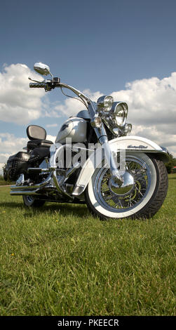 Gleaming White Harley-Davidson Heritage Softail motorbike Stock Photo