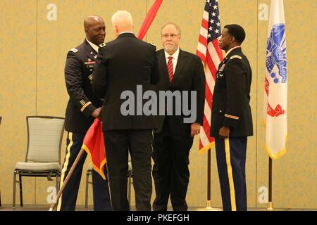 Col. Kenneth N. Reed assumed command from Col. Calvin C. Hudson II Friday in a ceremony officiated by Brig. Gen. Paul E. Owen, U.S. Army Corps of Engineers Southwestern Division.   The formal change of command ceremony took place at 2 p.m. at the Omni Hotel in Fort Worth, Texas. Stock Photo