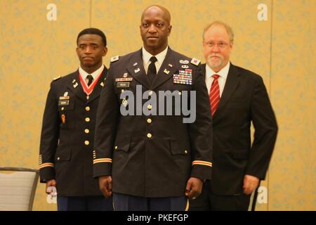 Col. Kenneth N. Reed assumed command from Col. Calvin C. Hudson II Friday in a ceremony officiated by Brig. Gen. Paul E. Owen, U.S. Army Corps of Engineers Southwestern Division.   The formal change of command ceremony took place at 2 p.m. at the Omni Hotel in Fort Worth, Texas. Stock Photo