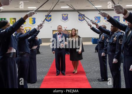 Technical sergeants celebrate their selction for master sergeant during a senior NCO induction ceremony at Barksdale Air Force Base, La., Aug. 10, 2018. Stock Photo