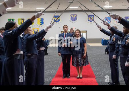 Technical sergeants celebrate their selction for master sergeant during a senior NCO induction ceremony at Barksdale Air Force Base, La., Aug. 10, 2018. Stock Photo