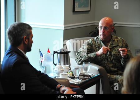 U.S. Navy Adm. Kurt Tidd, commander of U.S. Southern Command, chats with Paraguay President-elect Mario Abdo Benitez during a private meeting at the U.S. military headquarters July 30. Abdo Benítez, Tidd and other senior leaders discussed the U.S.-Paraguay defense partnership. The close collaborative ties between the United States and Paraguay include many decades of strong security cooperation based on common interests, shared goals and mutual respect. Stock Photo