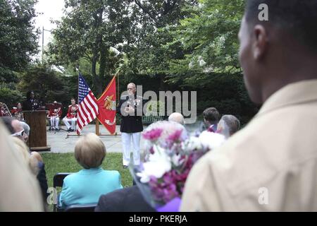 Commandant of the Marine Corps Gen. Robert B. Neller speaks to guests during a promotion ceremony held at Marine Barracks Washington, D.C., July 30, 2018. Marine Col. Daniel J. Lecce was promoted to Maj. Gen. and appointed as the staff judge advocate to the Commandant of the Marine Corps. Stock Photo