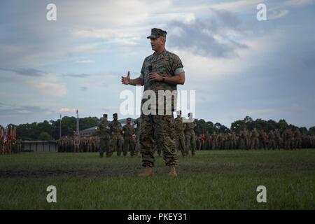 U.S. Marine Corps Maj. Gen. David J. Furness, the incoming commanding general of 2nd Marine Division, speaks during a change of command ceremony held on Camp Lejeune, N.C. Aug. 2, 2018. Furness spoke on the honor of receiving his new command from Maj. Gen. John K. Love. Stock Photo