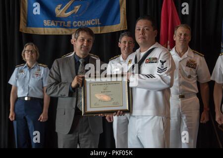 SEATTLE (Aug. 3, 2018) Master-at-Arms 1st Class Thomas Patrick Murphy is awarded Naval Station Everett Sailor of the Year during a Seattle Navy League Sea Services Luncheon as part of Seattle’s Seafair Fleet Week. Seafair Fleet Week is an annual celebration of the sea services wherein Sailors, Marines and Coast Guard members from visiting U.S. Navy and Coast Guard ships and ships from Canada make the city a port of call. Stock Photo