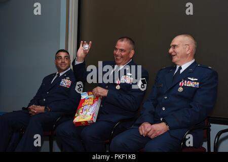 rig. Gen. Timothy J. LaBarge gives Master Sgt. John W. Linder a