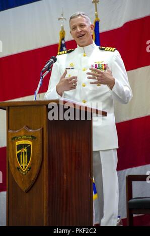 NAVAL SUPPORT ACTIVITY SOUDA BAY, Greece (August 3, 2018) Captain Ryan T. Tewell, prospective commanding officer, Naval Support Activity Souda Bay, Greece, speaks during a change of command ceremony held onboard the installation.  During the ceremony Tewell relieved Capt. Brad J. Collins as commanding officer, Naval Support Activity Souda Bay, Greece. Stock Photo