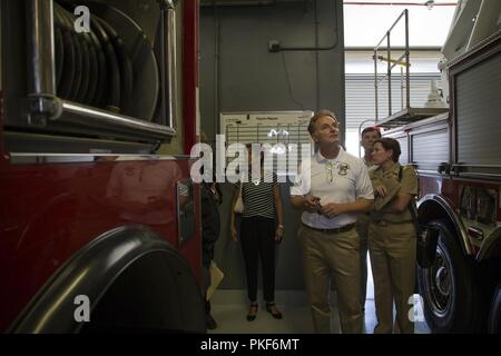 The Honorable Mr. Thomas B. Modly, undersecretary of the Navy, Department of the Navy, looks around Fire Station 1 during a tour of Marine Corps Base Camp Pendleton, California, Aug. 8, 2018.  Modly was sworn in as the Undersecretary of the Navy by The Honorable Richard V. Spencer, Secretary of the Navy, on Dec. 4 2017. Stock Photo