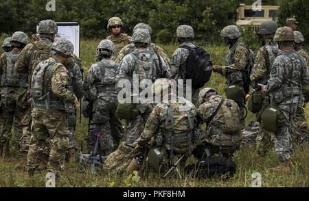 U.S. Army Reserve Soldiers of the 801st Combat Support Hospital participate in lethal warrior training as part of Global Medic 2018 on Fort McCoy, Wisconsin, Aug. 7, 2018. Global Medic is a training exercise designed to ensure the Army Reserve Medical Command (ARMEDCOM) provides trained, capable and ready combat units of action to the Army and the joint force. Stock Photo