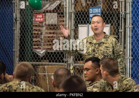 IMPERIAL BEACH (August 9, 2018) Capt. Stan Chien, commander of Coastal Riverine Group (CRG) 1, speaks during Navy Expeditionary Combat Command (NECC) Resiliency Leadership Forum participated in by Sailors assigned to CRG 1 held onboard Naval Outlying Landing Field Imperial Beach. NECC Resiliency Leadership Forum provides crucial discussions between Sailors and leadership about suicide-related behavior, post-traumatic stress disorder, work/life balance and overcoming stigma to seek help. Stock Photo