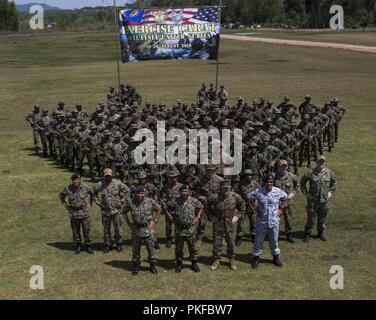 U.S. Marine Corps 2nd Battalion 3rd Marines Fox Company and 22nd Royal Malay Army Regiment make a triangular formation at Malaysian Royal Army Base Kota Belud, Malaysia, August 10th, 2018 Marines and sailors with 3rd Marine Division and the 13th Marine Expeditionary Force will train with our allies in the Pacific for one month. Our comprehensive partnership with Malaysia is pivotal in maintaining regional security in the Indo-Pacific. Stock Photo