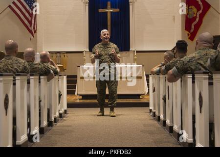 Rear Adm. Gregory Todd, the current Chaplain of the Marine Corps, Deputy Chief of Chaplains, Deputy Director of Religious Ministries praises Sailors for their hard work during a visit to Marine Corps Base Camp Lejeune, Aug 9, 2018. Todd assumed his current duties as the 20th Chaplain of the United States Marine Corps in June 2018. Stock Photo