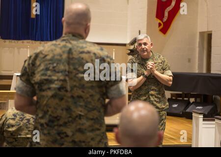 Rear Adm. Gregory Todd, the current Chaplain of the Marine Corps, Deputy Chief of Chaplains, Deputy Director of religious Ministries takes questions during a visit to Marine Corps Base Camp Lejeune, Aug. 9, 2018.  Todd assumed his current duties as the 20th Chaplain of the Marine Corps in June 2018. Stock Photo