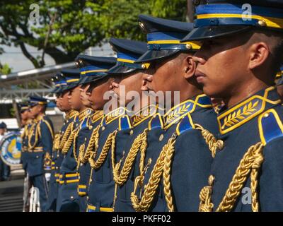 Philippine Air Force airmen dressed in formal uniform stand in formation for a pass in review ceremony, Aug. 6, 2018, Villamor Air Base, Manila, Philippines. The ceremony was part of the opening events of a National Guard State Partnership Program engagement between the PAF and airmen from the Hawaii Air National Guard. Stock Photo