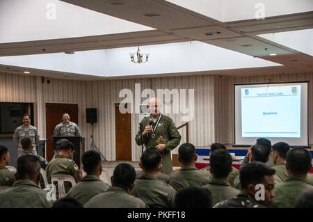 U.S. Air Force Maj. Gen. James O. Eifert, Air National Guard Assistant to the Commander, Pacific Air Forces speaks to pilots from the Philippine Air Force, Aug. 9, 2018, Clark Air Force Base, Philippines. Maj. Gen. Eifert was speaking about the complexities of air defense during a subject matter expert exchange engagement between the PAF and the Hawaii Air National Guard. Stock Photo