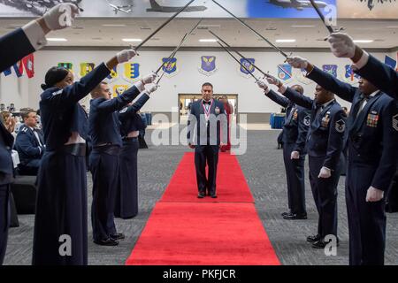 Technical sergeants celebrate their selction for master sergeant during a senior NCO induction ceremony at Barksdale Air Force Base, La., Aug. 10, 2018. Stock Photo