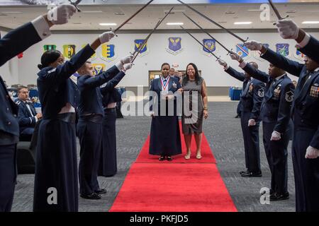 Technical sergeants celebrate their selction for master sergeant during a senior NCO induction ceremony at Barksdale Air Force Base, La., Aug. 10, 2018. Stock Photo