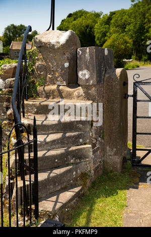 UK, Yorkshire, Wharfedale, Linton Falls, St Michael and All Angels church, steps and narrow stile at Church Road gate Stock Photo