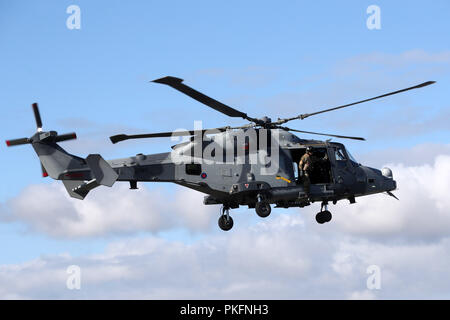 The Duke of Sussex (not seen) arrives in an AH1 wildcat helicopter with the 847 naval air squadron during a visit to the Royal Marines Commando Training Centre in Lympstone, Devon. Stock Photo