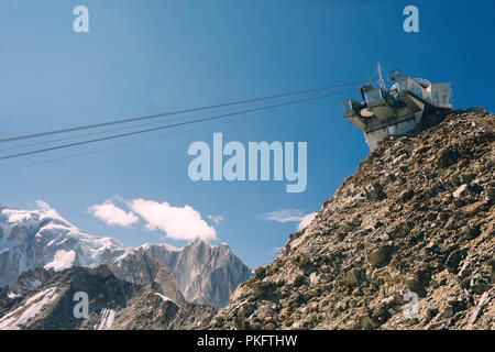 View from a cabin of cable car during the climbing on the panoramic terrace Punta Helbronner near Monte Bianco, Mont Blanc, Italy Stock Photo