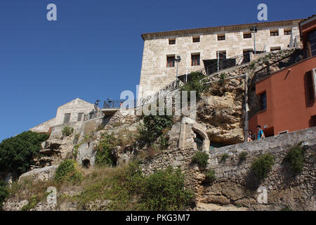 Spain. Balearic Islands. Menorca. Mahón. View from below of old town clifftop buildings. Stock Photo