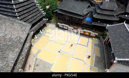 Sanjiang, China's Guangxi Zhuang Autonomous Region. 13th Sep, 2018. Villagers air grain in Gaoxiu Village in Sanjiang Dong Autonomous County, south China's Guangxi Zhuang Autonomous Region, Sept. 13, 2018. Credit: Wu Lianxun/Xinhua/Alamy Live News Stock Photo