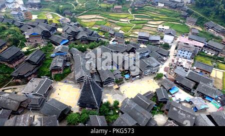 Sanjiang, China's Guangxi Zhuang Autonomous Region. 13th Sep, 2018. Villagers air grain in Gaoxiu Village in Sanjiang Dong Autonomous County, south China's Guangxi Zhuang Autonomous Region, Sept. 13, 2018. Credit: Wu Lianxun/Xinhua/Alamy Live News Stock Photo