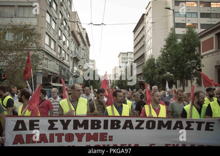 Athens, Greece. 13th Sep, 2018. Protesters seen holding a banner saying, We are not compatible during the demonstration.Protest requesting not to change the five-day and eight-hour periods and calling for sectorial contracts with wage increases. Credit: Nikolas Joao Kokovlis/SOPA Images/ZUMA Wire/Alamy Live News Stock Photo