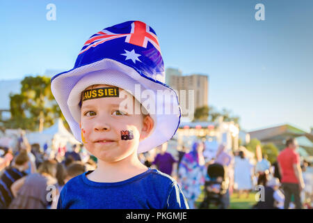 Cute Australian boy with Aussie tattoos on his face on Australia Day celebration in Adelaide Stock Photo