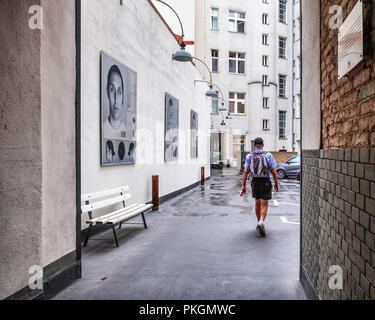 Berlin,Mitte,Torstrasse 109. Open-air gallery with exhibition of large photographic images by CAMERADOS in an inner courtyard of a building. Stock Photo