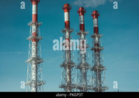 Industrial zone,The equipment of oil refining,Close-up of industrial pipelines of an oil-refinery plant Stock Photo