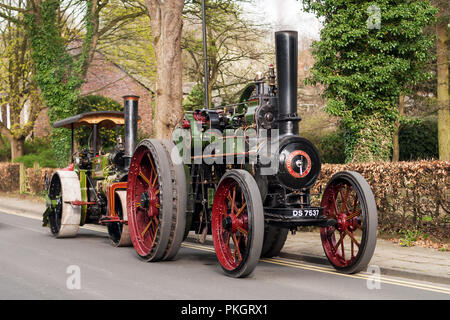Steam Traction Engine on New Road in Prestbury village, Cheshire. Stock Photo