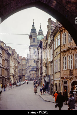 View of St Nicholas Church from underneath Lesser Town Bridge Tower in Prague, Czechoslovakia in April 1974. Original Archive Photo.