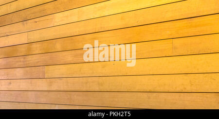 Exterior wood wall with golden brown color Stock Photo