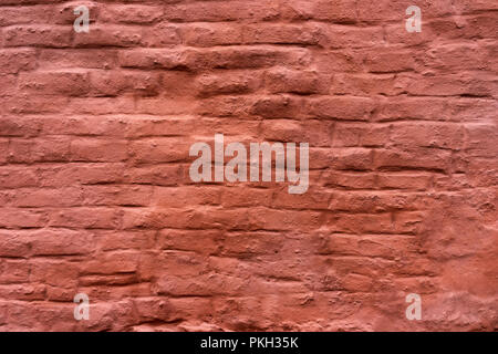 Painted uneven brick wall Stock Photo