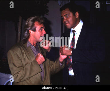 London. UK. LIBRARY. Peter Stringfellow and Muhammed Ali  in Stringfellow's Nightclub.  Circa late 1980s. UPDATE: Peter Stringfellow's death announced. 7th June 2018.  Ref:LMK11-SPIPLIB070618-001 PIP-Credit: Landmark / MediaPunch. Stock Photo