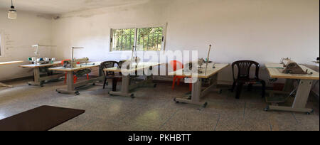 Sewing machines in the workshop of a textile cooperative of women workers in the rural area of Khizana, Chefchaouen, Morocco Stock Photo