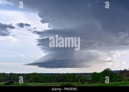 A supercell thunderstorm cumulonimbus cloud near Ashland, Montana Stock Photo