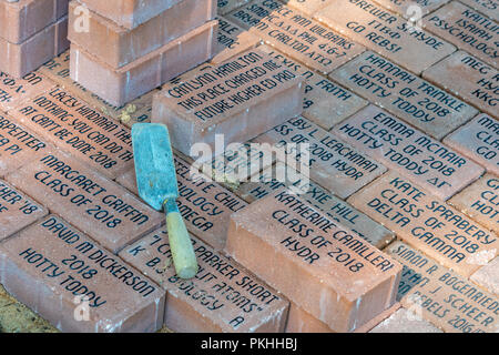 OXFORD, MS/USA - JUNE 7, 2018: Sidewalk cobblestone pavers with names of student graduates on the campus of the University of Mississippi. Stock Photo