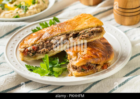 Homemade Lamb and Tomato Arayes Pita with Hummus Stock Photo