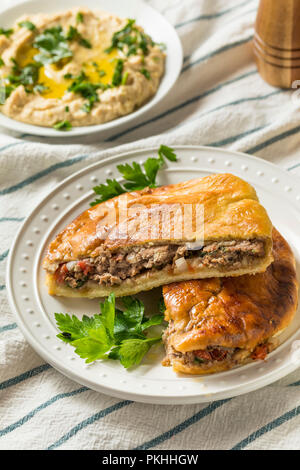 Homemade Lamb and Tomato Arayes Pita with Hummus Stock Photo