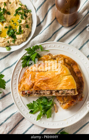 Homemade Lamb and Tomato Arayes Pita with Hummus Stock Photo