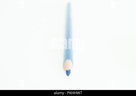 An isolated blue colored pencil on a white background. Stock Photo