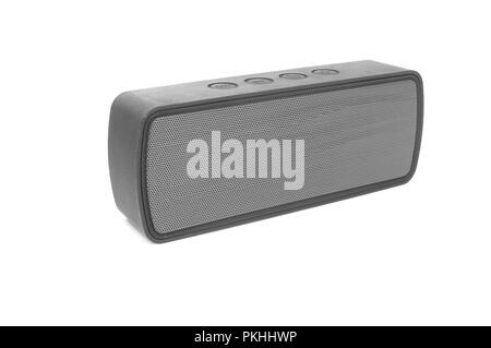 An isolated bluetooth speaker angled on a white background. Stock Photo