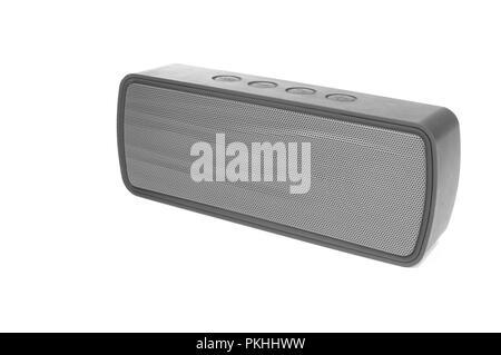 An isolated bluetooth speaker angled on a white background. Stock Photo