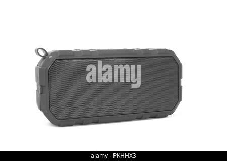 An isolated bluetooth speaker angled on a white background. Stock Photo